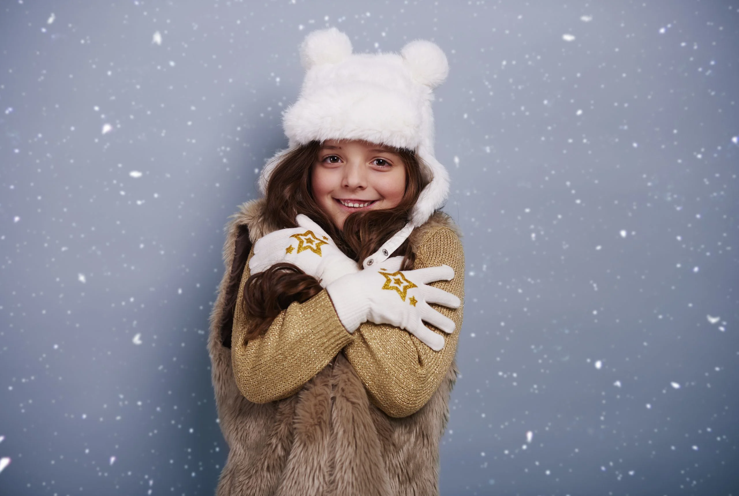 Cute girl shivering with cold
